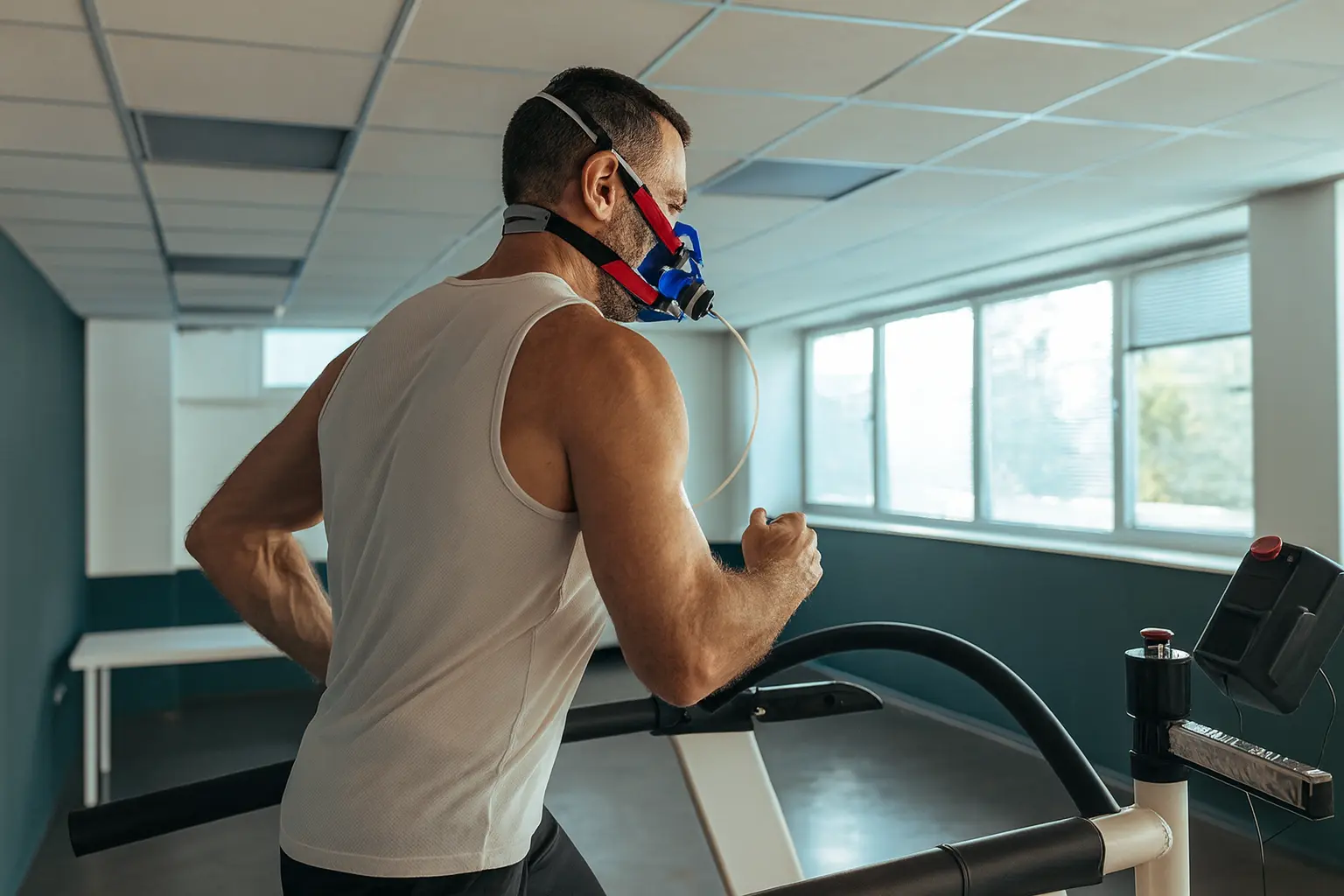 Athlete running on treadmill with EWOT