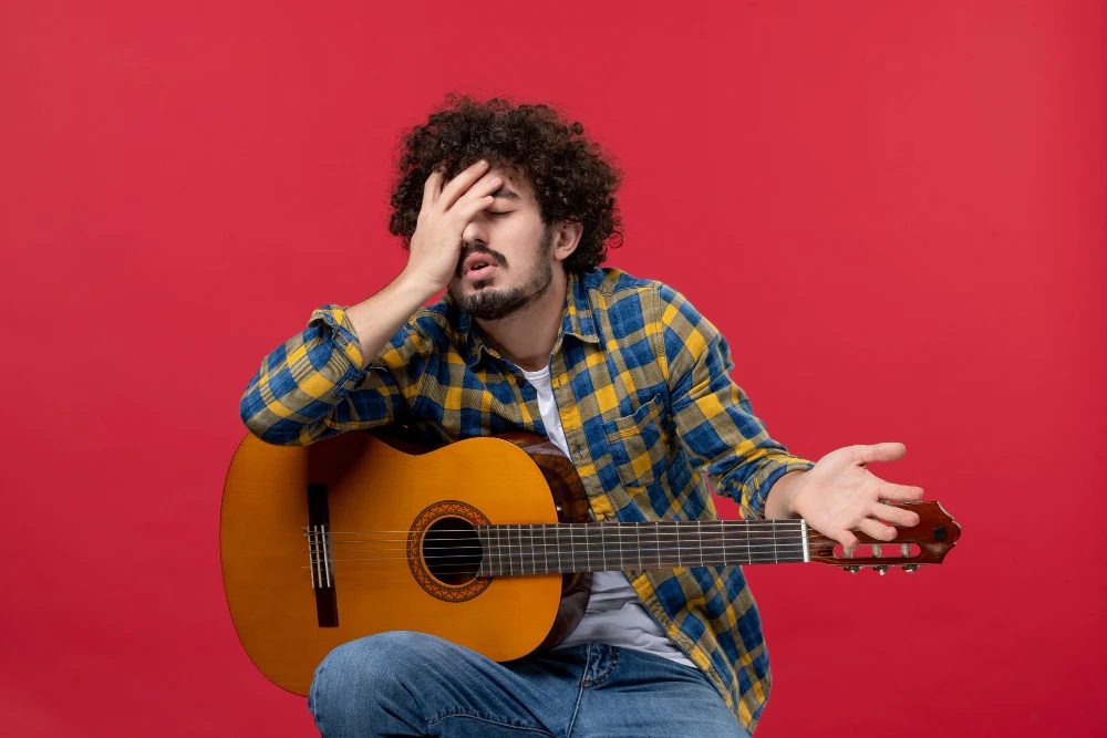 Musician experiencing hand and head pain from performance