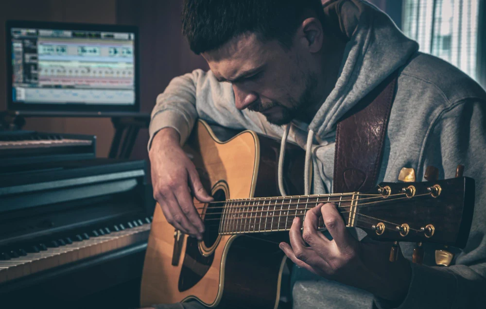 Musician experiencing neck pain while playing instrument