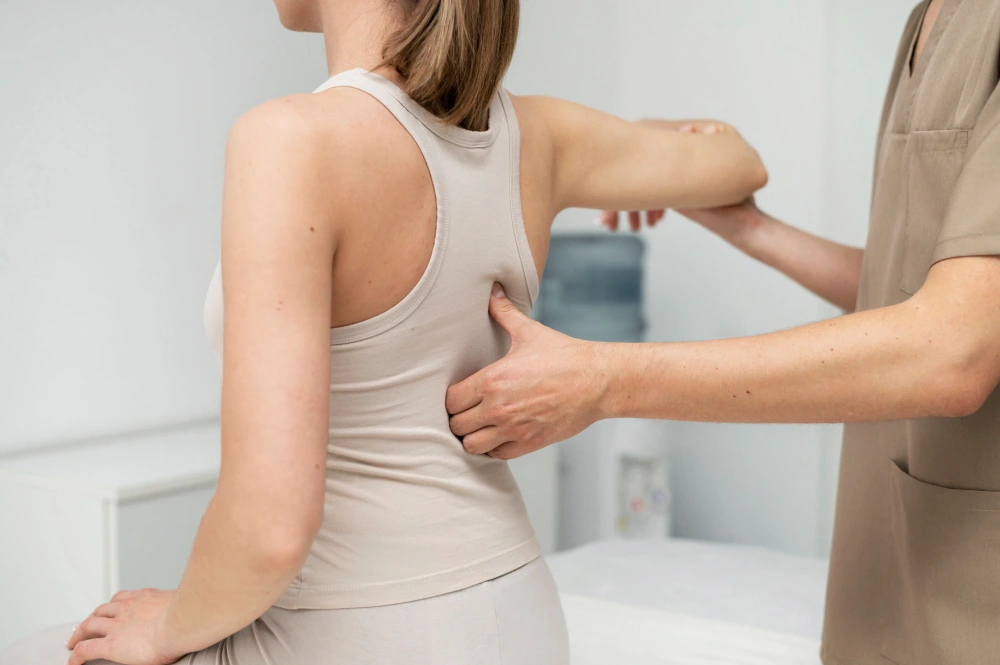 Person showing poor posture with neck and back strain