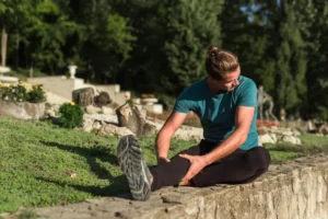 Active adult experiencing minor injury during outdoor summer recreation